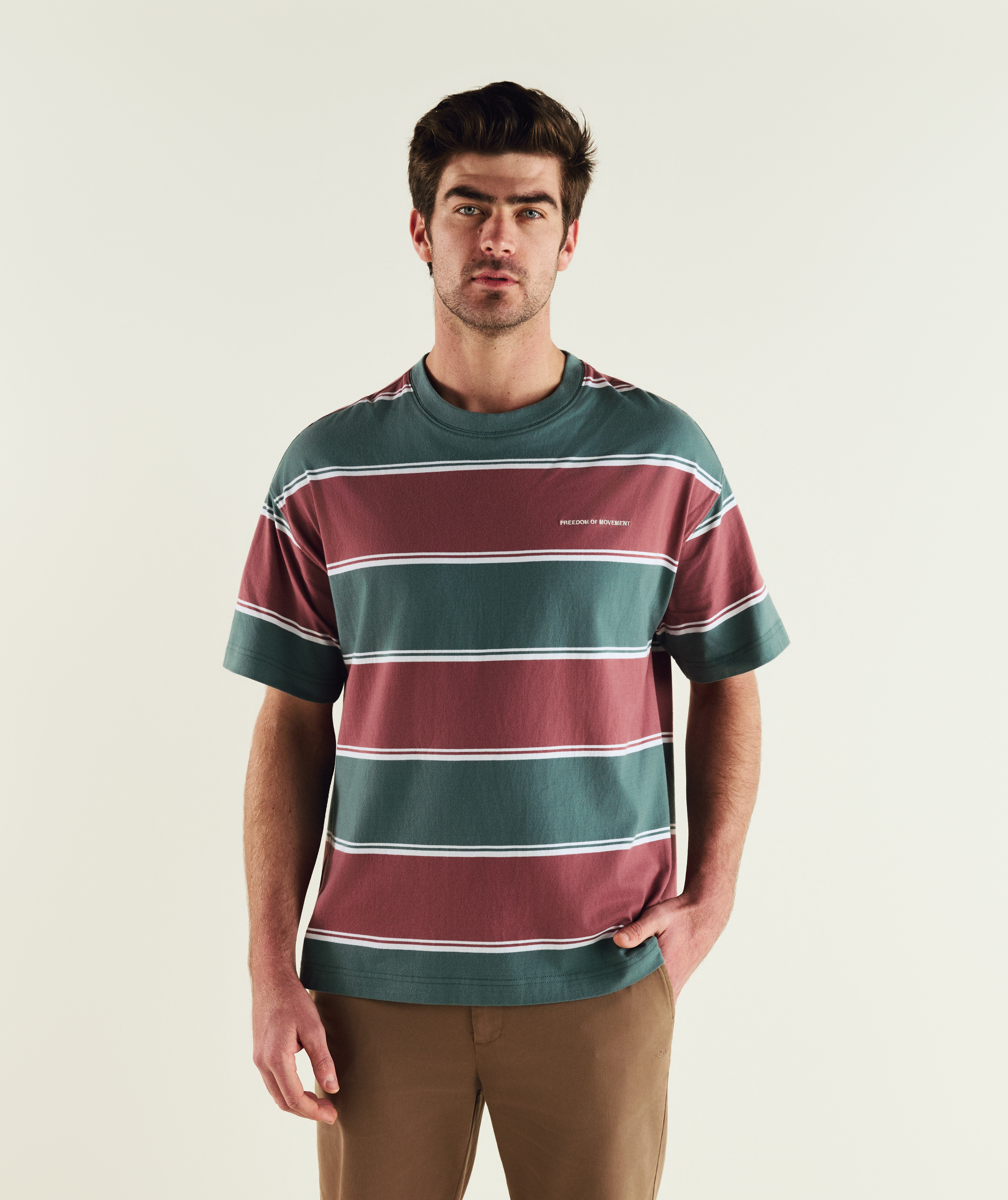 Man wearing FOM relaxed stripe tee in burgundy and green