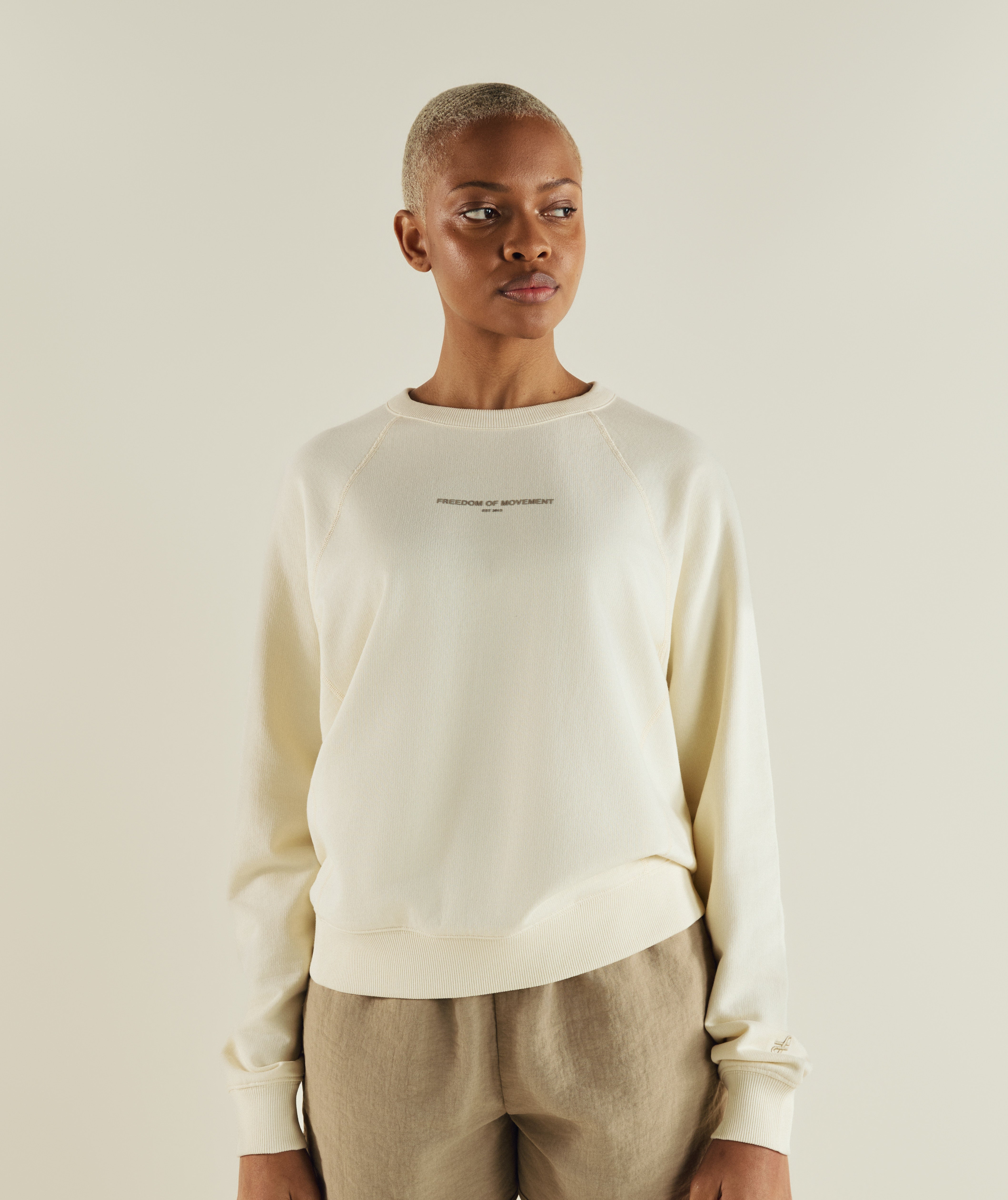 Woman wearing FOM ladies textured crew neck sweat in ivory