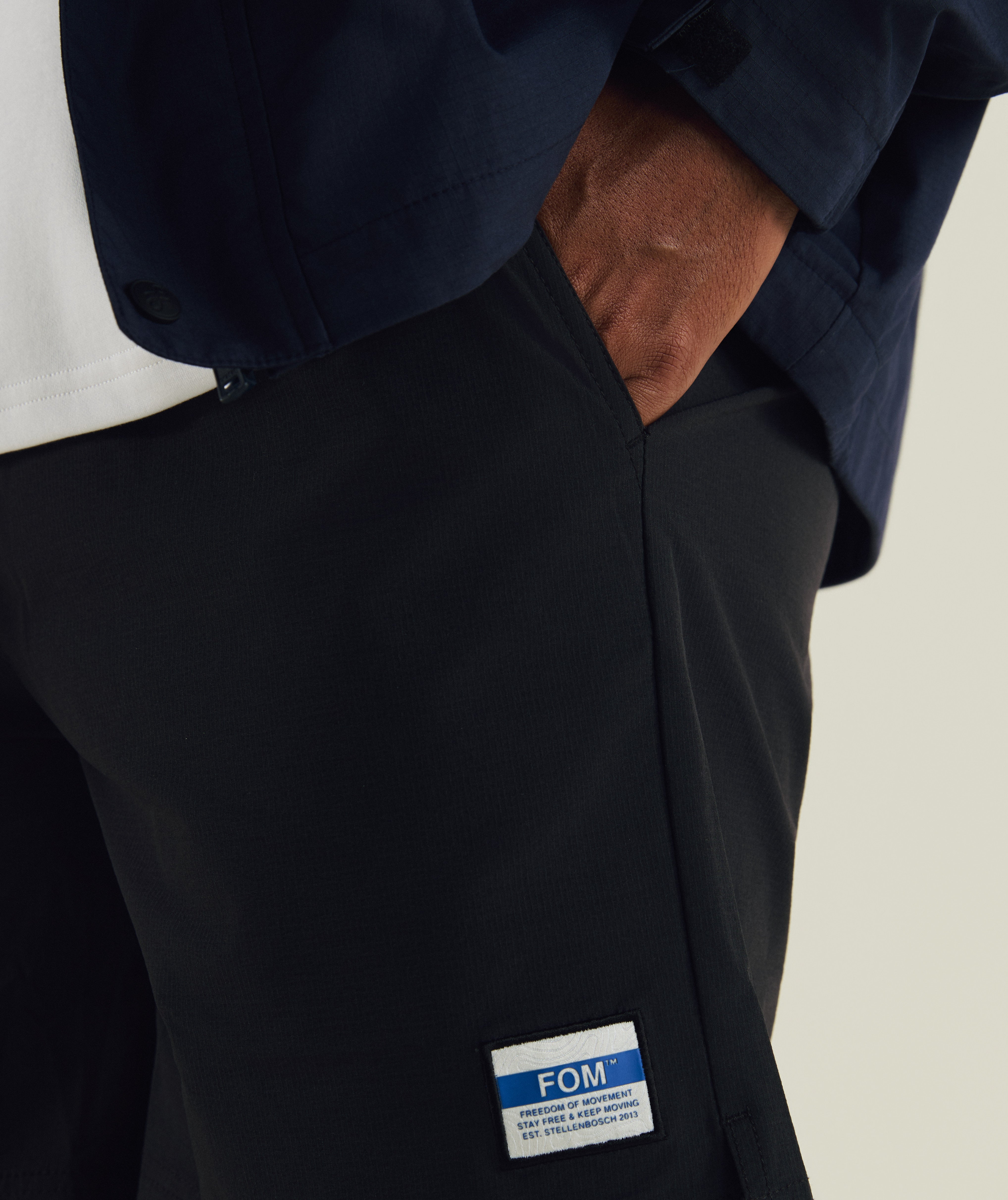 FOM FreeMotion micro ripstop shorts in black, on-model view