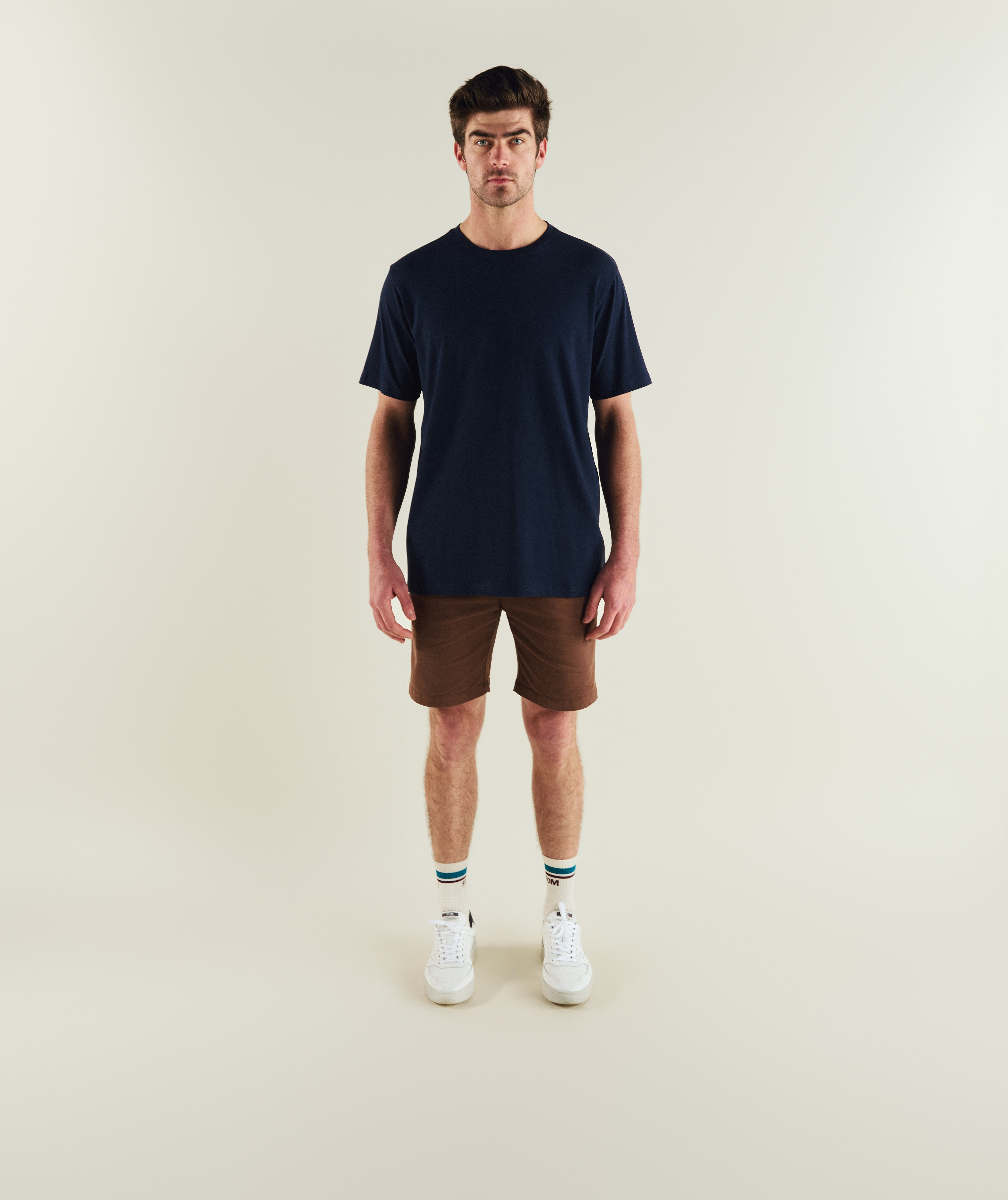 FOM mens essential 3-pack tees in ivory, green and navy, on-model view