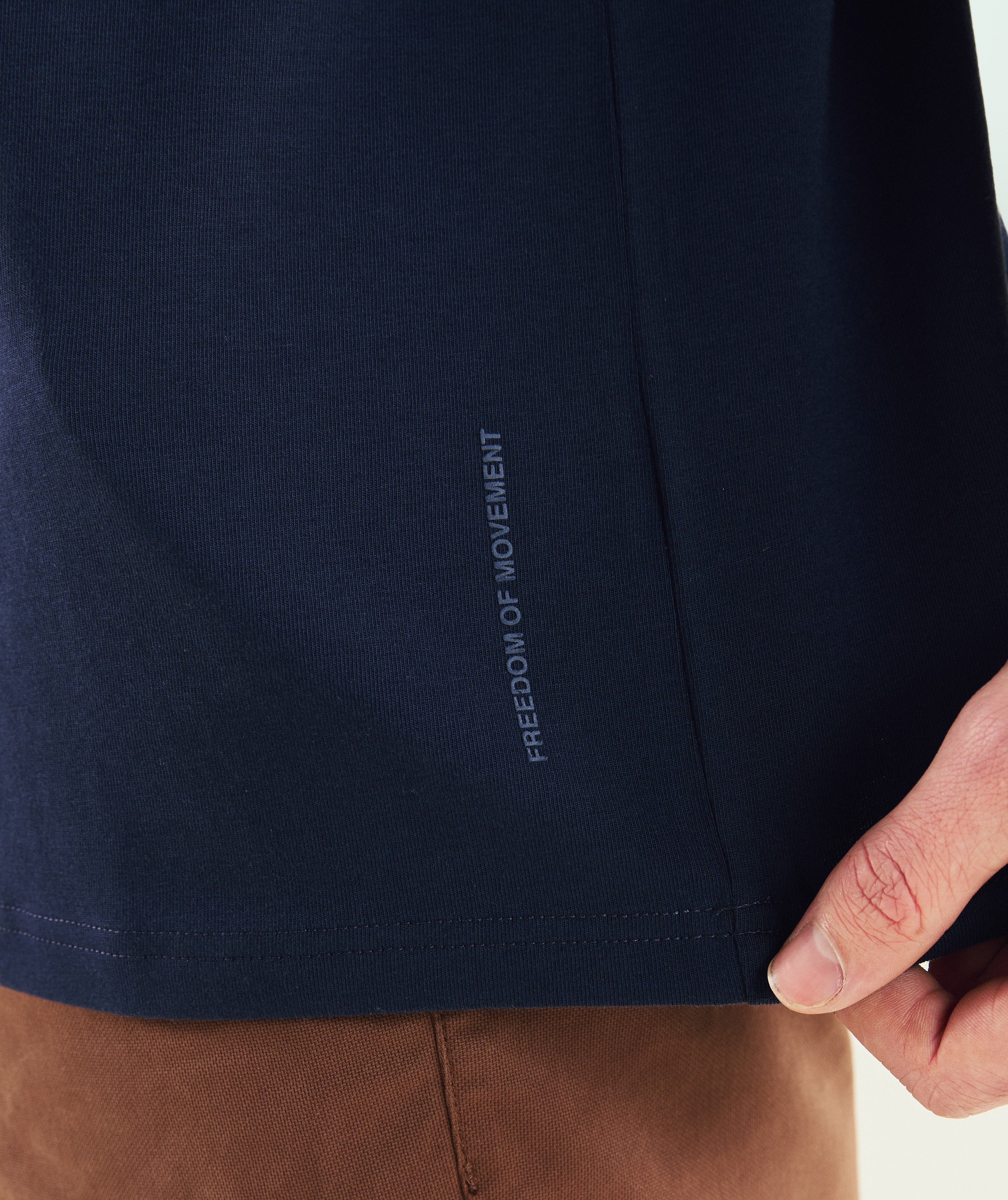FOM mens essential 3-pack tees in ivory, green and navy, on-model view