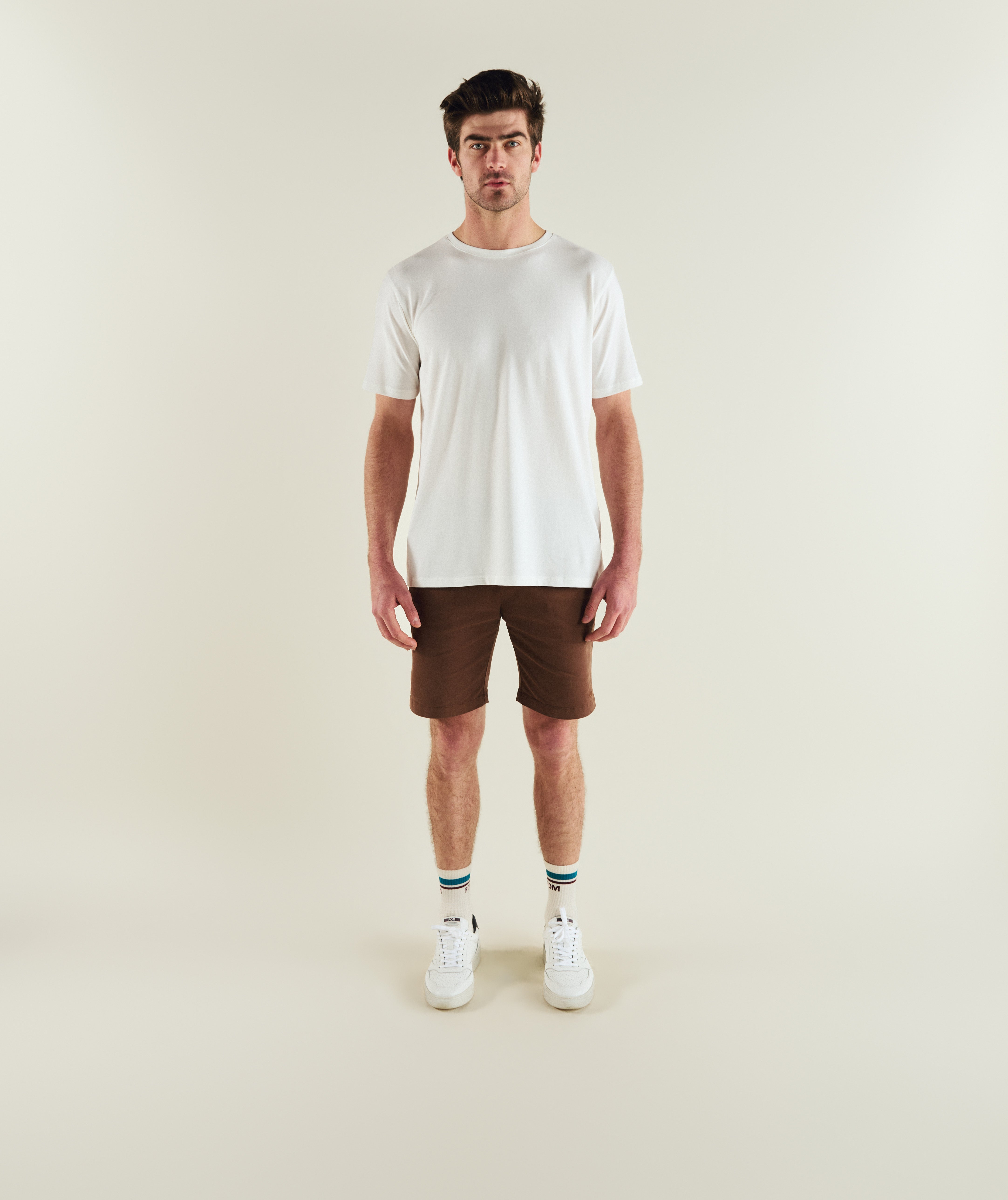 FOM mens essential 3-pack tees in ivory, green and navy, on-model view