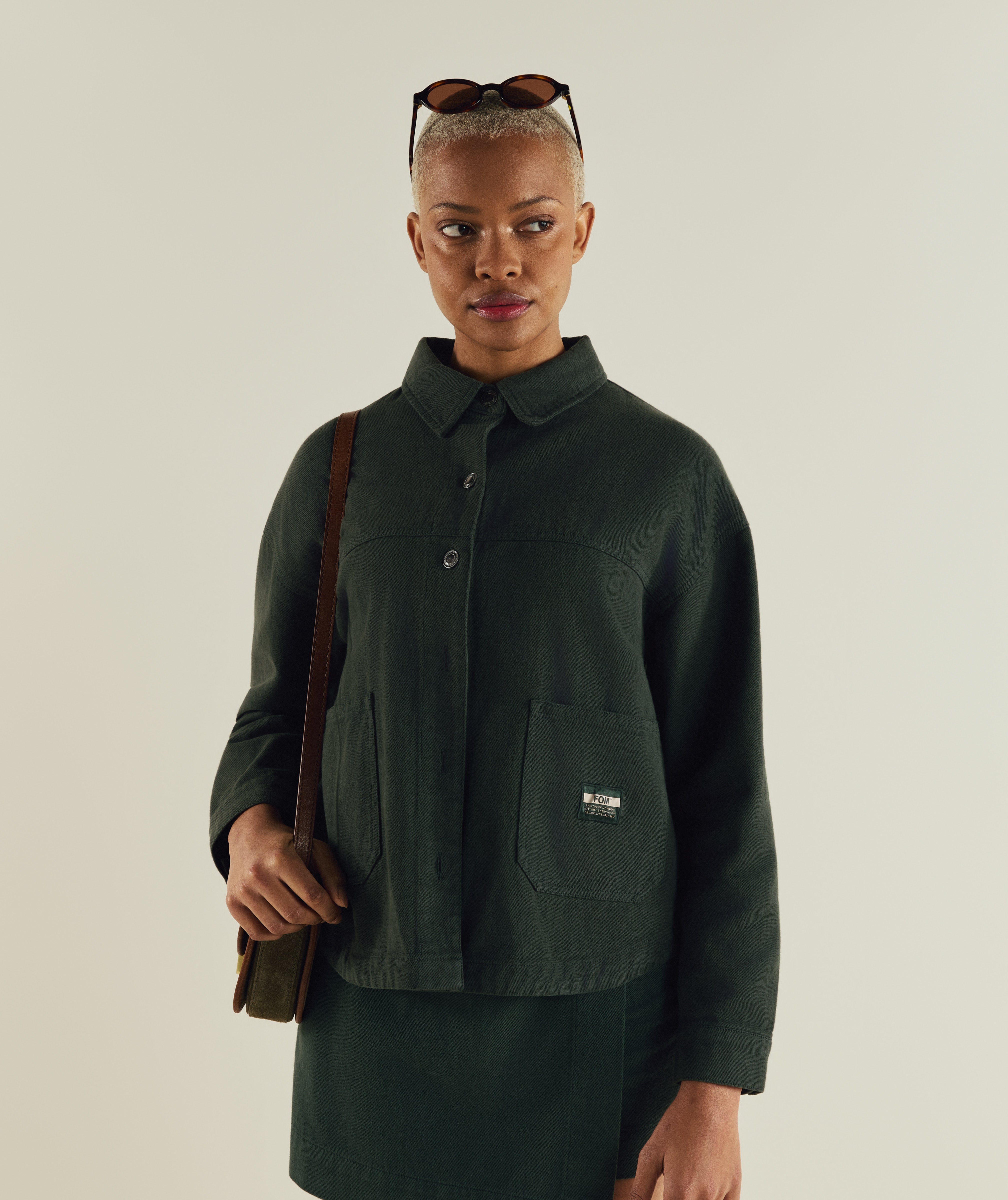 Woman wearing FOM ladies shacket in dark green