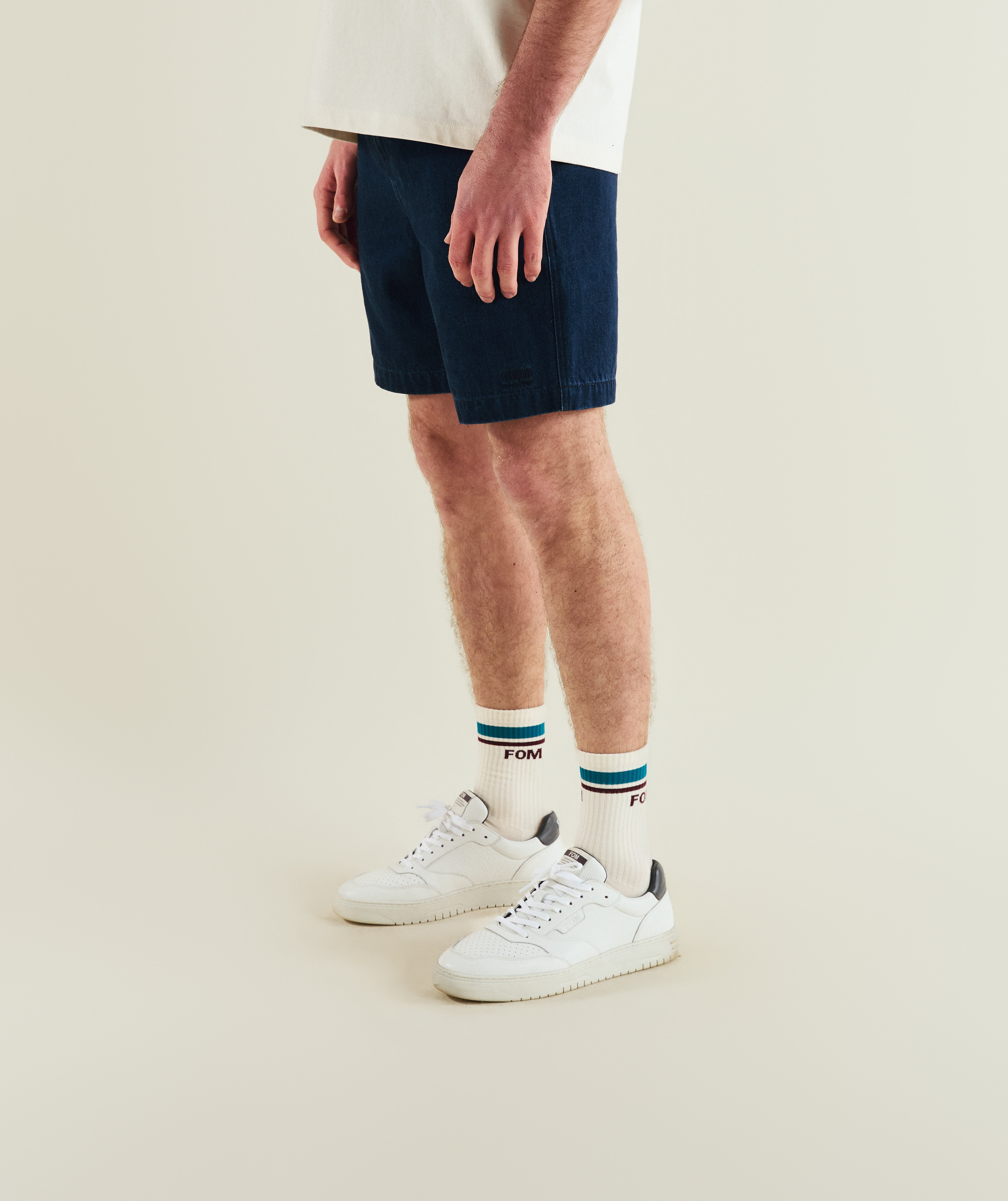 FOM x Kolisi cotton twill shorts in dark indigo, on-model view