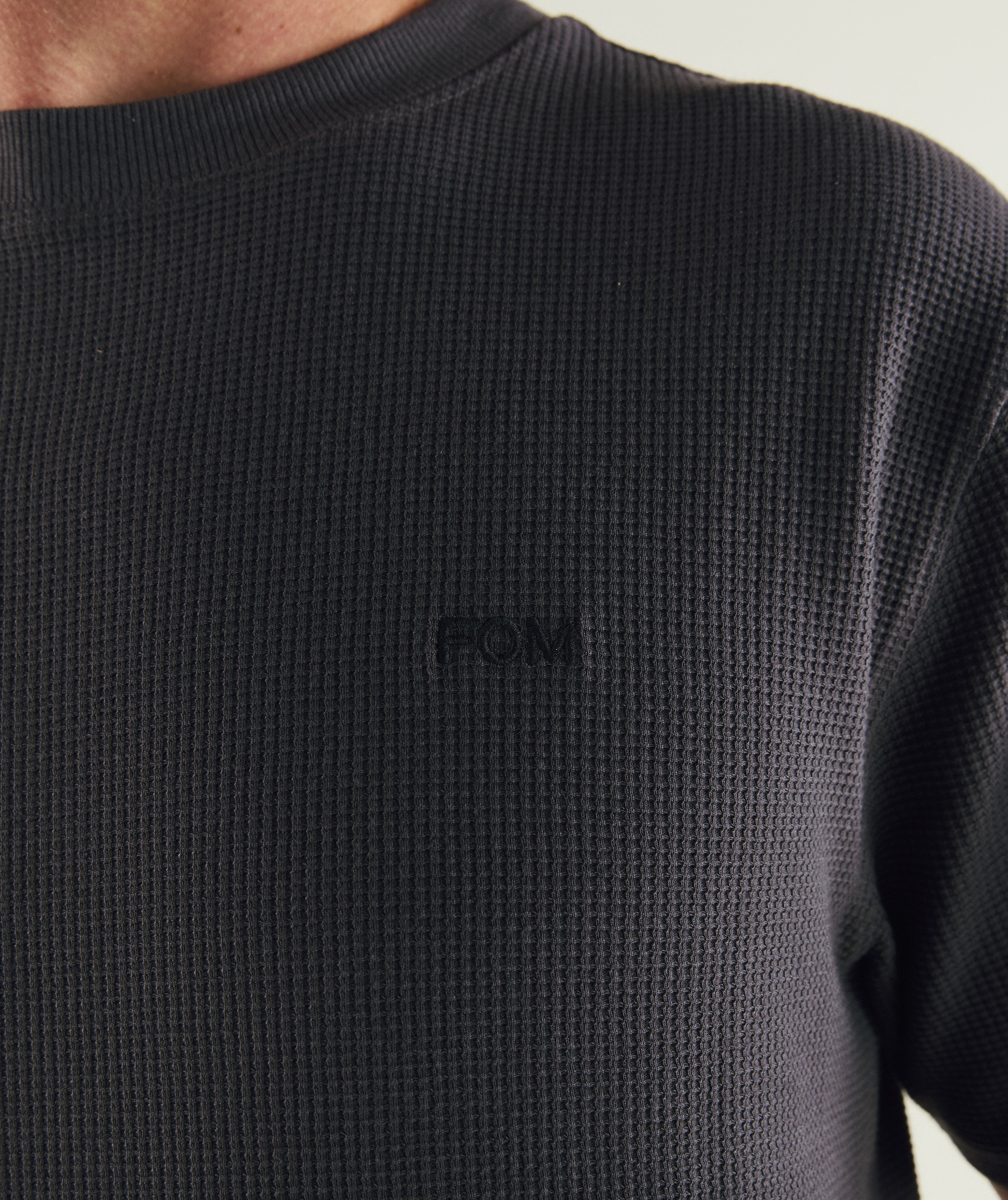 Man wearing FOM mens waffle tee in charcoal