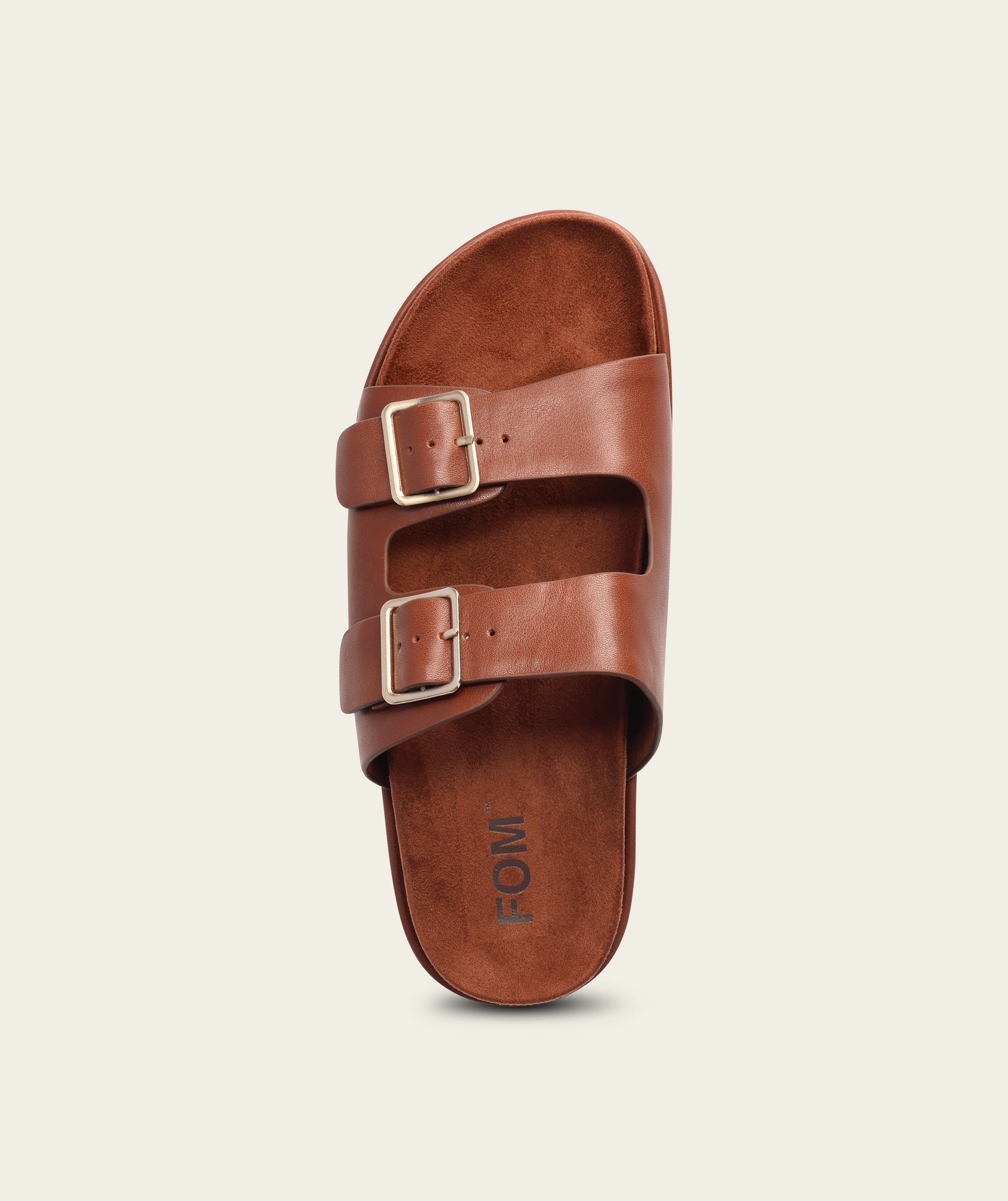Top-down view of the FOM Dani ox choc leather slide sandal showing the FOM-branded suede footbed