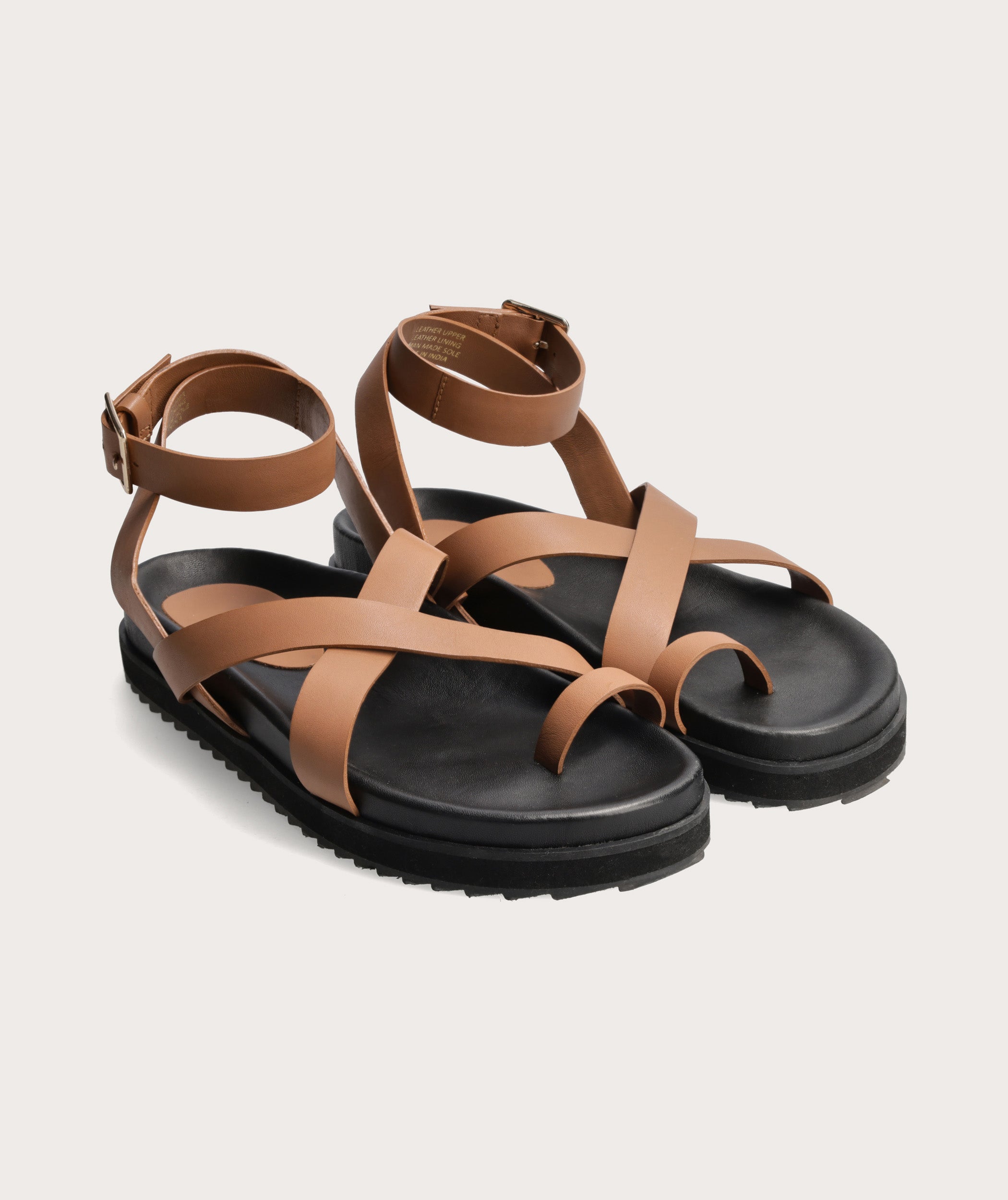 ladies tan flip flops