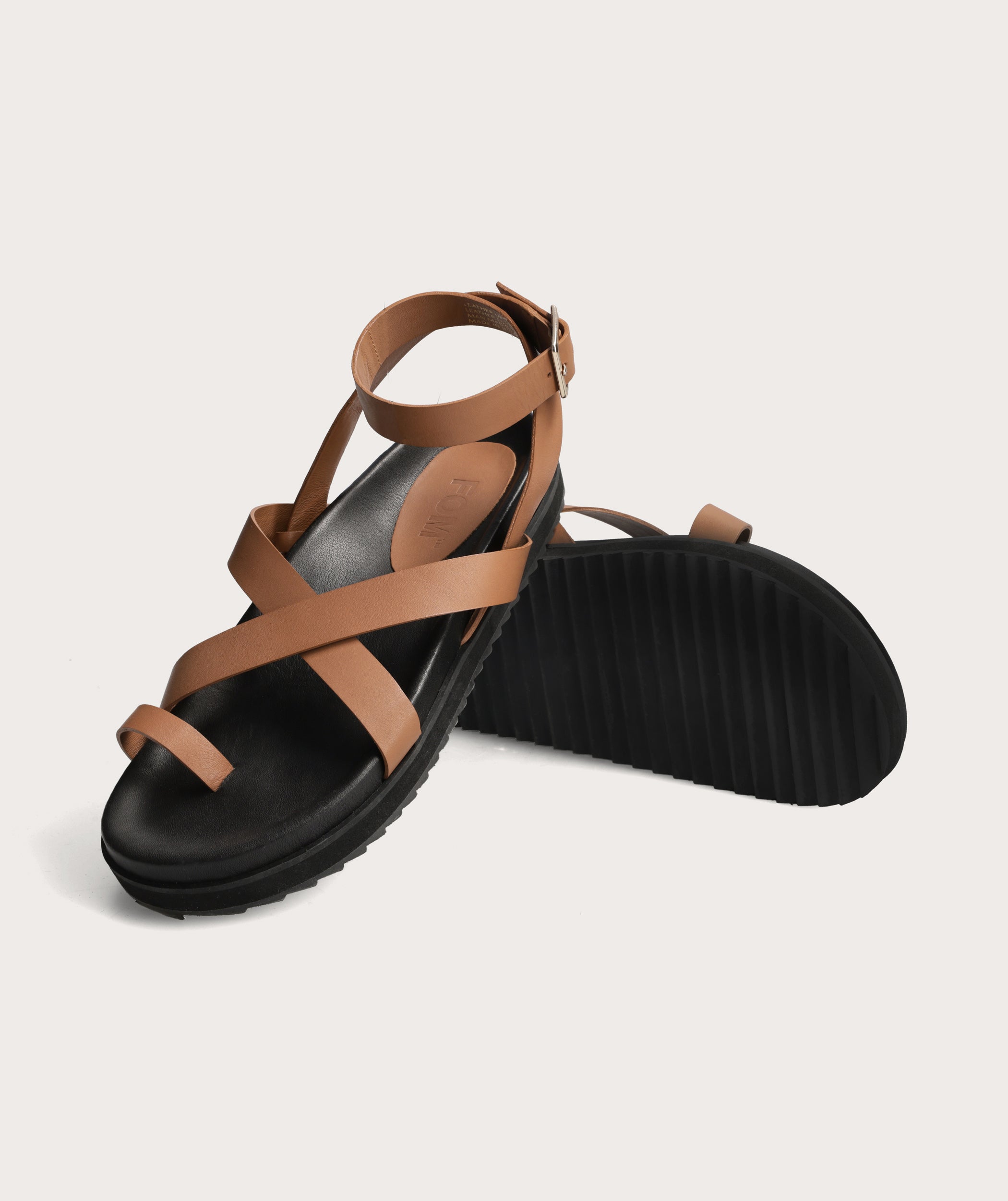 ladies tan flip flops