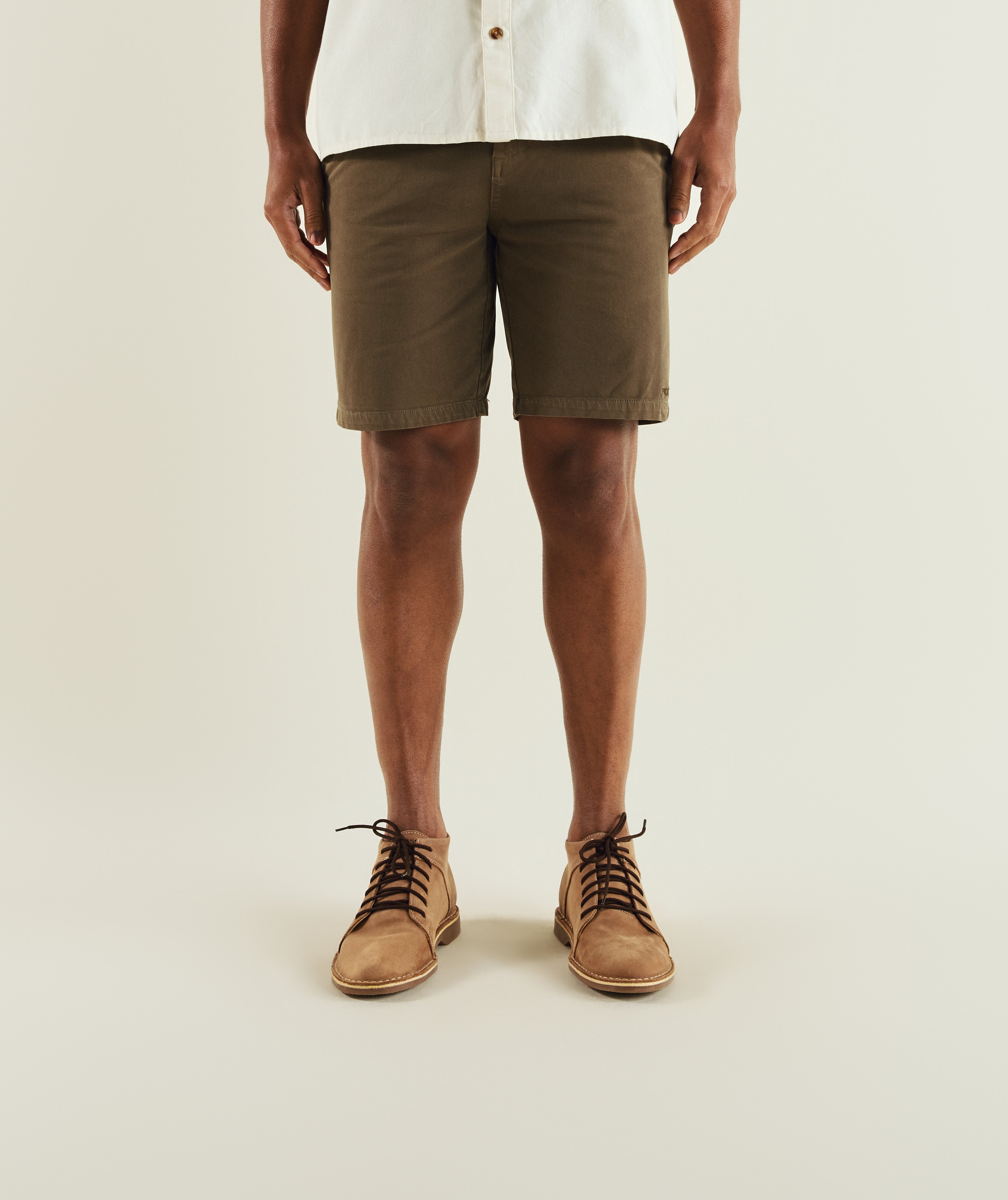Man wearing FOM cotton twill chino shorts in olive