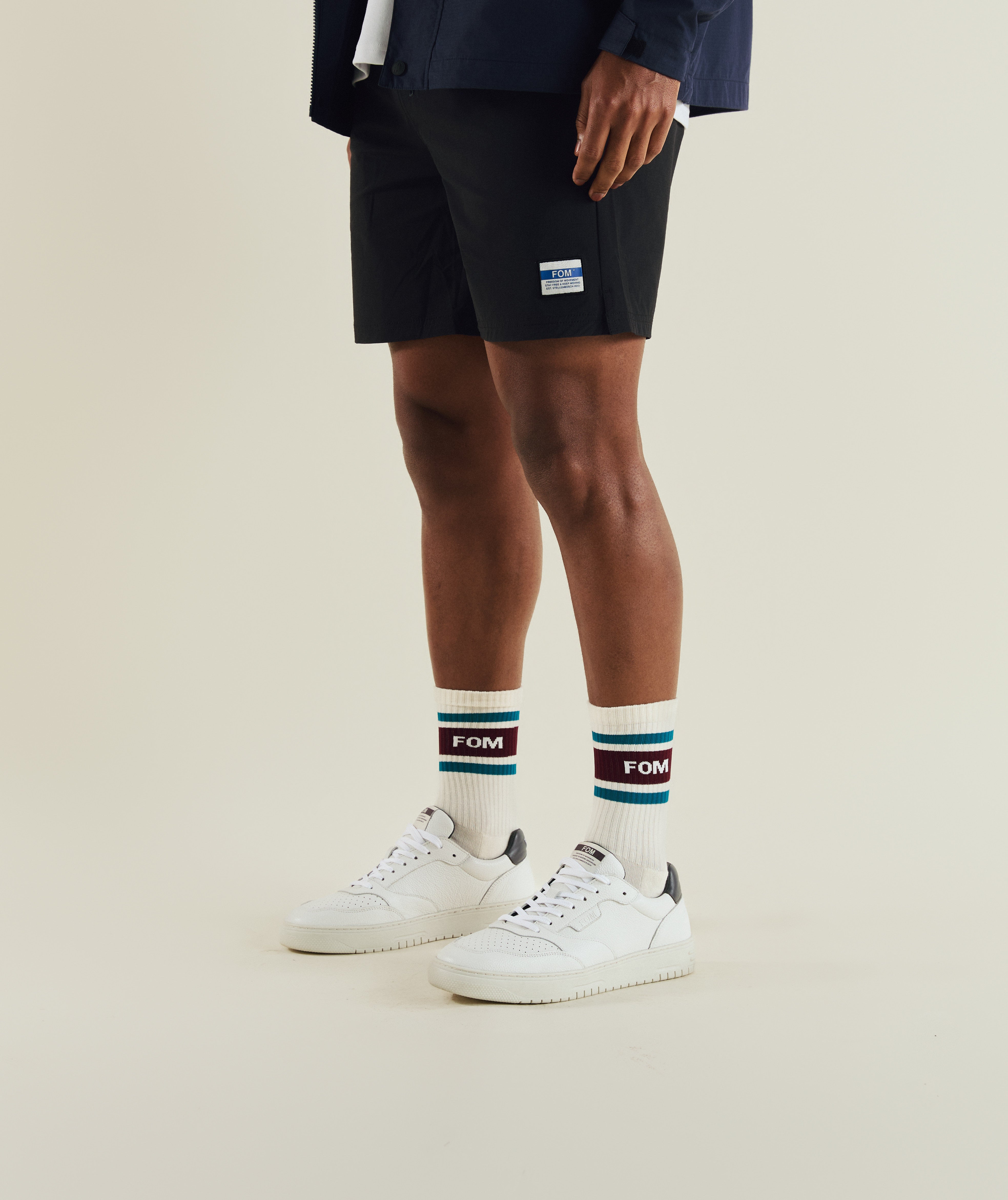 FOM FreeMotion micro ripstop shorts in black, on-model view