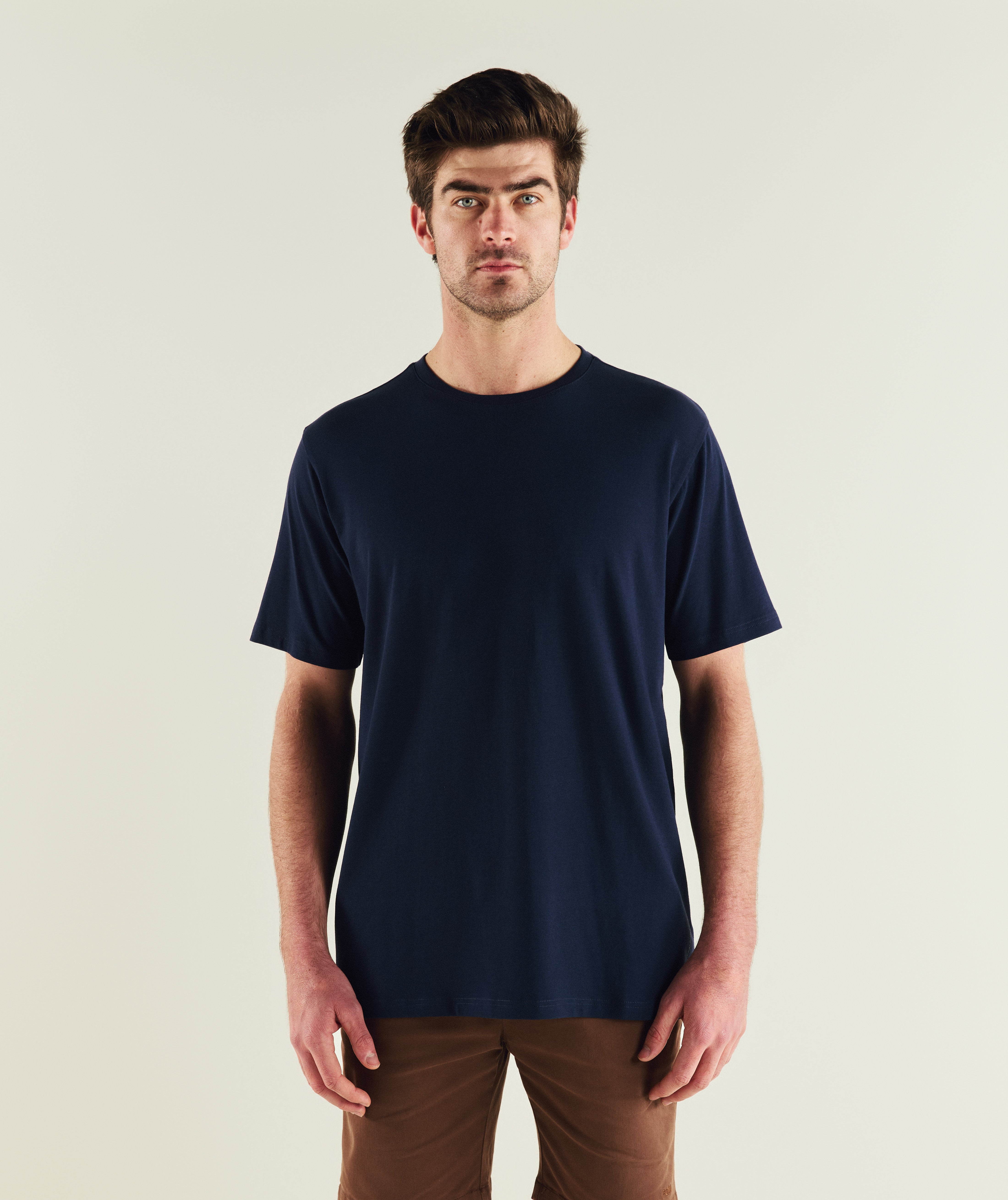 FOM mens essential 3-pack tees in ivory, green and navy, on-model view