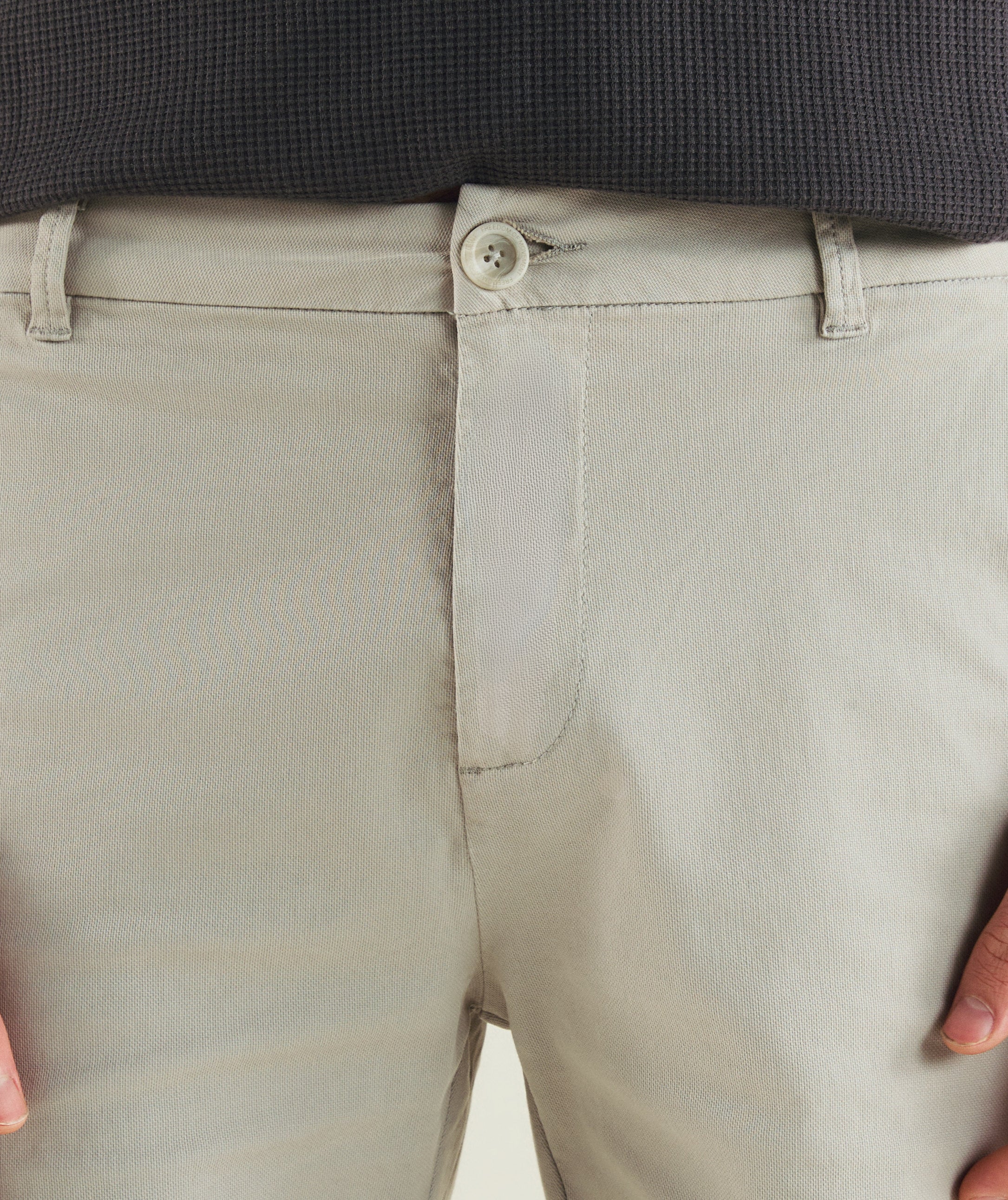 Man wearing FOM cotton canvas chino shorts in cement