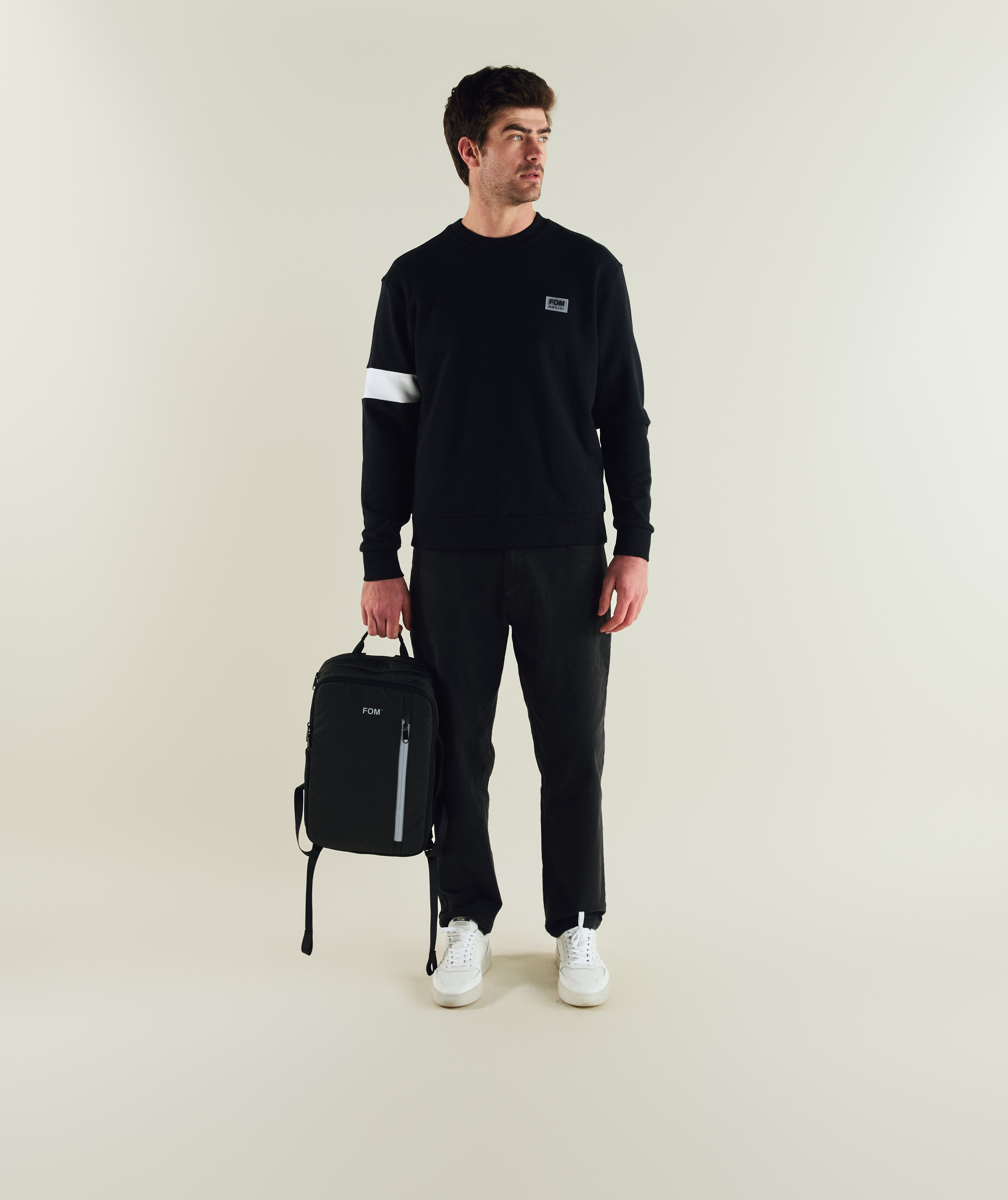 Man wearing FOM x Kolisi captains sweater in black