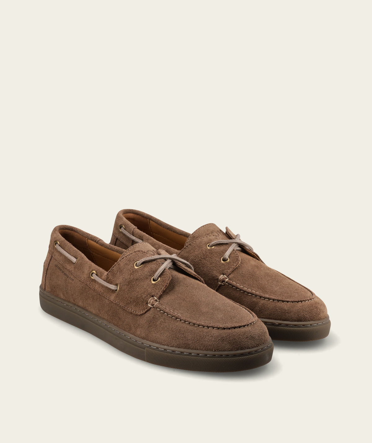 FOM Cruz boat shoe in lite brown suede, side profile showing the twin waxed laces and dark chocolate gum sole